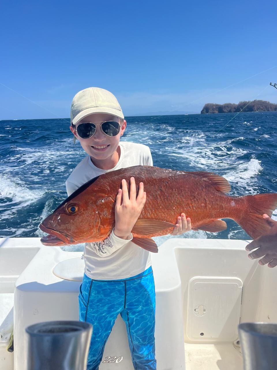 Young angler, big cubera